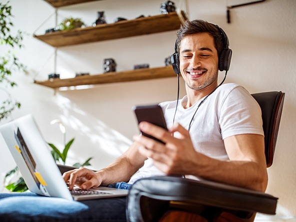 Man watching ads on mobile device